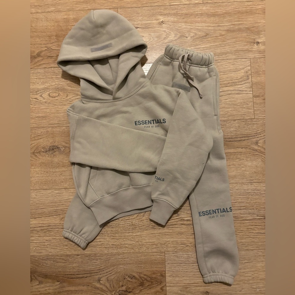Boy’s Fear of God Essentials track suit in light brown